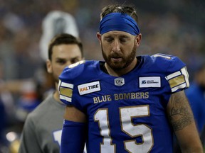 Injured Winnipeg Blue Bombers quarterback Matt Nichols leaves the field for the locker room during CFL action against the B.C. Lions in Winnipeg on Aug. 15, 2019.