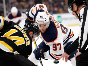Edmonton Oilers center Connor McDavid (97) prepares for a face off against Boston Bruins right wing Chris Wagner (14) during NHL action on Jan. 4, 2020, at TD Garden.