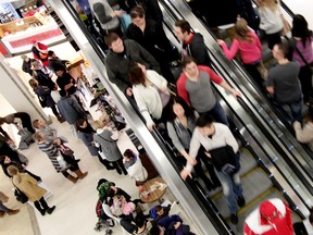 Boxing Day shoppers make there way through West Edmonton Mall, in Edmonton, Alta., on Thursday Dec. 26, 2013. David Bloom/Edmonton