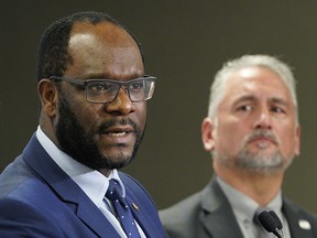 Municipal Affairs Minister Kaycee Madu, left, and Alberta Urban Municipalities Association president Barry Morishita at the AUMA President’s Summit on Municipal Finances in January.