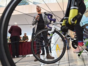 Canadian triathlete Tyler Mislawchuk speaks at the 2020 ITU Triathlon Grand Final official kickoff at city hall on Monday, Jan. 27, 2020. The event will be held Aug. 17-23.