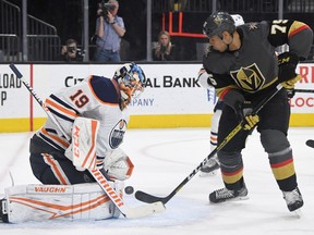 Mikko Koskinen (19) of the Edmonton Oilers defends the net against Ryan Reaves (75) of the Vegas Golden Knights at T-Mobile Arena on Wednesday, Feb. 26, 2020 in Las Vegas.