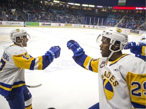 Saskatoon Blades forward Caiden Daley, right, celebrates a goal with forward Martin Fasko-Rudas against the Lethbridge Hurricanes during first period WHL action at SaskTel Centre in Saskatoon, SK on Saturday, February 1, 2020.