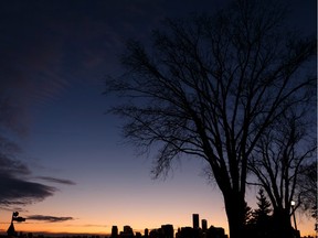 Downtown is seen after sunset from 77 Street and Jasper Avenue during warm winter weather in Edmonton, on Friday, Dec. 27, 2019.