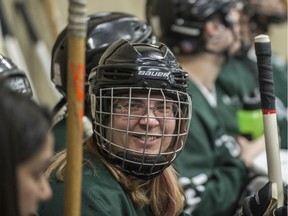 Shannon Szmydt of the Edmonton Cougars is all smiles on the bench during a game against the Strathcona County Thunder as Special Olympics Alberta-Edmonton held its annual Floor Hockey Invitational tournament at the Edmonton Expo Centre with over 200 athletes and 16 teams  from across the province on Saturday, Feb. 1, 2020.