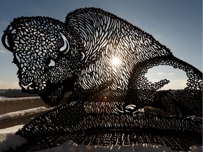 The sun shines through Joe Fafard's Paskwamostos sculpture outside of the Edmonton Convention Centre; daytime mercury is to stay above zero until Saturday.