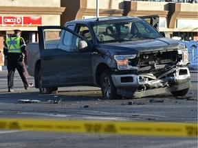 A damaged pickup truck is seen after a collision at 99 Street and 82 Avenue on Monday, Feb 10, 2020. The crash was the result of a chase that began in Wetaskiwin and ended in Edmonton with three arrests.