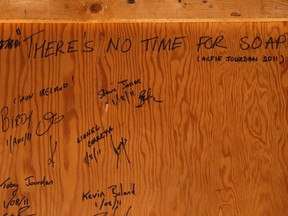 Notes from hikers and riders adorn the walls of the Mile 58 Summit Cabin, seen during a trip with conservation officers into Willmore Wilderness Park outside of Hinton, Alberta, to install its Alberta Provincial Historic Resource plaque on Wednesday, Feb. 19, 2020. Photo by Ian Kucerak/Postmedia