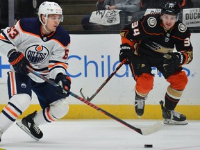 Edmonton Oilers center Tyler Ennis (63) moves in for a shot on goal against the defense of Anaheim Ducks center Sam Steel (34) during the first period at Honda Center.