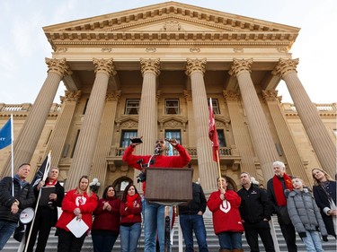 Poet Ahmed Ali, better known as Knowmadic, speaks as teachers, union members and supporters rally at the Alberta Legislature against the 2020 Alberta Budget during a march from downtown Edmonton on Thursday, Feb. 27, 2020. The budget was unveiled today by Alberta's United Conservative Party government.