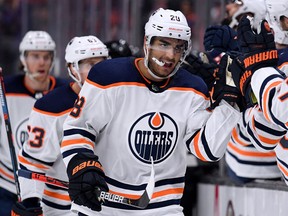 Edmonton Oilers forward Andreas Athanasiou celebrates his goal with the bench to tie the game 3-3 with the Anaheim Ducks during the third period in a 4-3 overtime Ducks win at Honda Center on Feb. 25, 2020, in Anaheim, Calif.