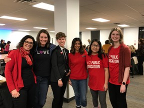 Attendees (from left) Cecelia Oteiza Ayres, Stephanie Cordova, Janis Irwin, Rakhi Pancholi, Wing Li and Allison Dakin at a special face-to-face engagement session on Alberta Education's draft Ministerial Order on Student Learning wearing red in support of public education on Thursday, Feb. 13, 2020.