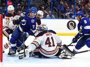 Tampa, Florida, USA; Edmonton Oilers goaltender Mike Smith (41) defends against Tampa Bay Lightning right wing Mathieu Joseph (7) during the first period at Amalie Arena on Thursday, Feb. 13, 2020.