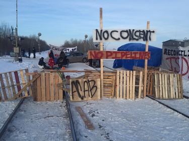 Protesters set up a camp on a CN rail line on 231 street west of Edmonton on Wednesday, Feb. 19, 2020.