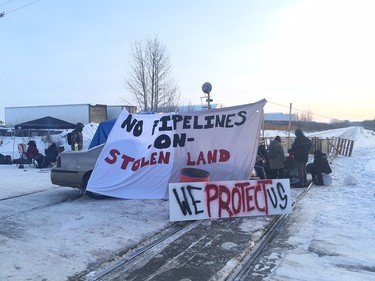 Protesters set up a camp on a CN rail line on 231 Street in west Edmonton on Wednesday, Feb. 19, 2020.