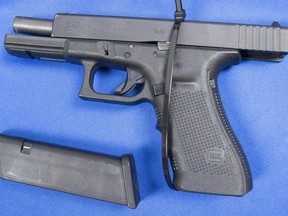 A file photo of a Glock 17, the same type as one of the 19 guns Kevin Walid Sifeldeen admitted to "straw purchasing" to resell on the black market. The Edmonton man was sentenced to 8 years in prison on Feb. 7, 2020. Postmedia file