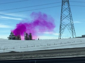 A pink/purple smoke fills the air east of Edmonton on Friday, Feb. 28, 2020. (Supplied photo/Twitter/@dar113)