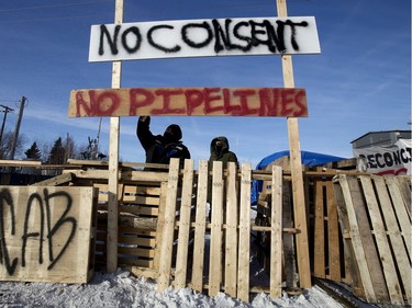 Protesters block the CN rail line near 213 Street and 110 Avenue in solidarity with Wet'suwet'en Hereditary Chiefs, Wednesday, Feb. 19, 2020.