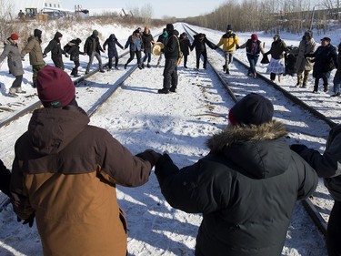 Protesters perform a round dance as they prepare to end their blockade at the CN rail line near 213 Street and 110 Avenue on Wednesday, Feb. 19, 2020.