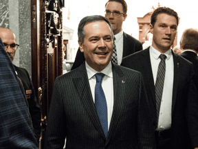 Alberta Premier Jason Kenney leaves the legislative chamber after the Speech from the Throne in Edmonton, Feb. 25, 2020.