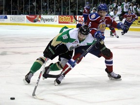 Prince Albert Raiders forward Noah Gregor (18) battles with Edmonton Oil Kings defenceman Wyatt McLeod of the WHL Eastern Conference Final at the Art Hauser Centre in Prince Albert, Sask., on Friday, April 20, 2019.