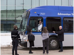 A special city bus provided transportation for homeless people leaving acute care centres as the EXPO Centre opened Monday in response to the COVID-19 crisis.