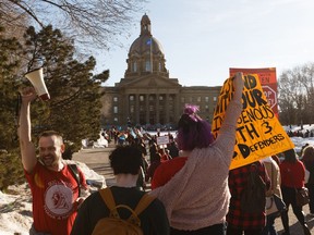Demonstrators in supporet of Indigenous rights and Wet'suwet'en hereditary leaders joined teachers, union members and supporters during a rally at the Alberta Legislature against the 2020 Alberta Budget in Edmonton on Thursday, Feb. 27, 2020.