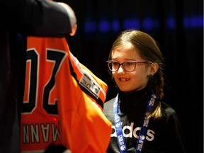 Claira Mann was one of 65 kids who signed a one-day contract and became an Edmonton Oiler during Boston Pizza's Oiler for a Day event held at Rogers Place in Edmonton, on Sunday, March 1, 2020.