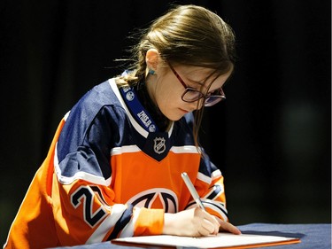 Claira Mann was one of 65 kids who signed a one-day contract and became an Edmonton Oiler during Boston Pizza's Oiler for a Day event held at Rogers Place in Edmonton, on Sunday, March 1, 2020.