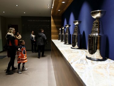 Participants visit the Edmonton Oilers dressing room during Boston Pizza's Oiler for a Day event held at Rogers Place in Edmonton, on Sunday, March 1, 2020.