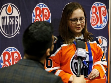 Reese Miller (right) is interviewed by Tony Brar, Oilers Digital Content Producer & Reporter, during Boston Pizza's Oiler for a Day event held at Rogers Place in Edmonton, on Sunday, March 1, 2020.