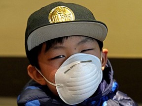 Edmontonian Marlon Lee is seen wearing a face mask. As the novel-coronavirus spreads around the world, more people are taking precautions.