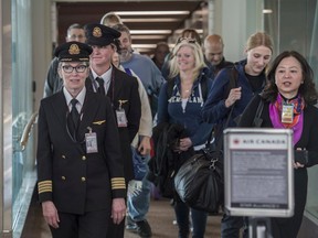 An all-female 787 Dreamliner crew directed from Toronto to Edmonton by women Air Traffic Controllers and all women ground crew arrive in the terminal.  Air Canada and Nav Canada celebrate Women of Aviation Week on March 5, 2020.