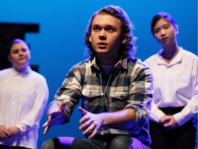(Left to right) Interviewers Julia Nolin, Tiffany Nguyen and Clyde Balagang listen to Declan Kelly, as Joe, during a performance of St. Albert Catholic High School's production of The Shadow Box at the Arden Theatre in St. Albert, on Thursday, March 5, 2020.