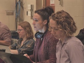 Playwright Belinda Cornish (second from right) sits in on cast readings of her play The Garneau Block, opening at the Citadel Theatre.