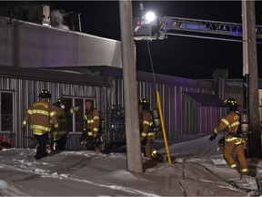 Firefighters respond to a fire that broke out in an industrial complex on 92 Street near 55 Avenue in Edmonton on Tuesday, March 10, 2020.