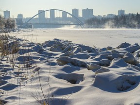 Mist rises from the North Saskatchewan river near the High Level bridge as the sun rises over Edmonton on Thursday, March 19, 2020.