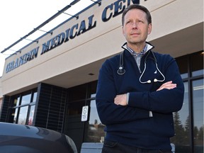 Dr. Darryl LaBuick outside the Grandin Medical Clinic in St. Albert, on how COVID-19 could bankrupt clinics because of low fees for virtual visits, March 20, 2020. Ed Kaiser/Postmedia