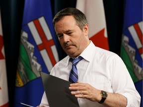 Premier Jason Kenney leaves a press conference about the COVID-19 pandemic with Dr. Deena Hinshaw, Chief Medical Officer of Health, and Tyler Shandro, Minister of Health, at the Alberta Legislature in Edmonton, on Wednesday, March 25, 2020.