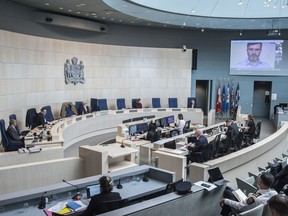 Emergency advisory committee at city hall renewed the local state of emergency due to  COVID-19 on March 26, 2020.  Photo by Shaughn Butts / Postmedia