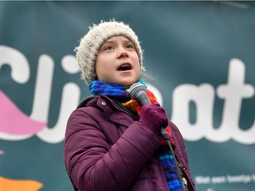 Swedish environmentalist Greta Thunberg speaks during a  "Youth Strike 4 Climate" protest march on March 6, 2020 in Brussels.