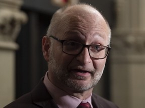 Minister of Justice and Attorney General of Canada David Lametti speaks with the media following a cabinet meeting on Parliament Hill in Ottawa, Tuesday, February 25, 2020. A Quebec court has given the federal government more time to amend its assisted-dying legislation.