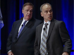 Canadian Natural Resources Ltd. president Tim McKay, right, with chairman Murray Edwards, prepares to address the company's annual meeting in Calgary, Thursday, May 9, 2019.