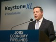 Alberta Premier Jason Kenney speaks in Calgary on Tuesday, March 31, 2020 about the the plan to kick-start construction on the Keystone XL pipeline.