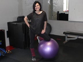 Deanna Harder, a CSEP (Canadian Society for Exercise Physiology) certified personal trainer in Edmonton poses for a picture at Custom Fit Training in Edmonton on March 18, 2020.
