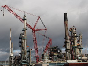 A construction crane is shown Friday at the Imperial Oil site in Sarnia. The company said it has scaled back work planned for a spring maintenance turnaround because of the COVID-19 outbreak.