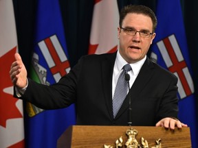 Government House Leader Jason Nixon discusses ongoing government operations during a news conference at the Legislature in Edmonton, March 16, 2020.