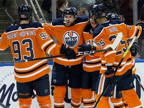 Leon Draisaitl (29) and the Edmonton Oilers celebrate Draisaitl's goal against the Nashville Predators during third period NHL action at Rogers Place on Feb. 8, 2020.