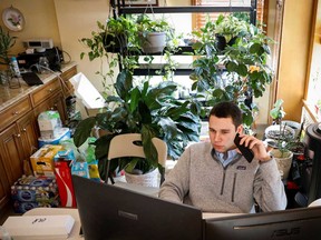 An options floor trader works in an off-site trading office built when the New York Stock Exchange closed, due to the outbreak of the coronavirus disease (COVID-19), in Brooklyn.