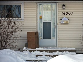 FILE: Mail, packages and snow pile up at a home in Edmonton, Thursday Jan. 23, 2020. Police are reminding you to watch for deliveries so your'e not targeted by criminals taking advantage of a higher number of deliveries due to COVID-19. Photo by David Bloom Override image ca